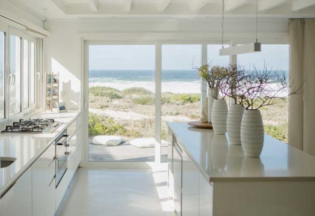 kitchen with white counters and glass doors